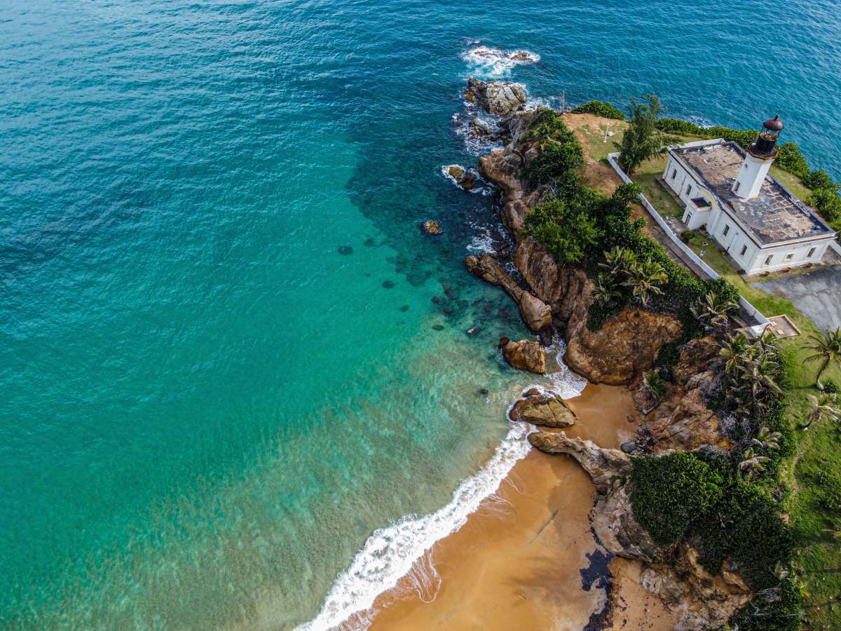 united states aerial view of green trees near body of water during daytime maunabo